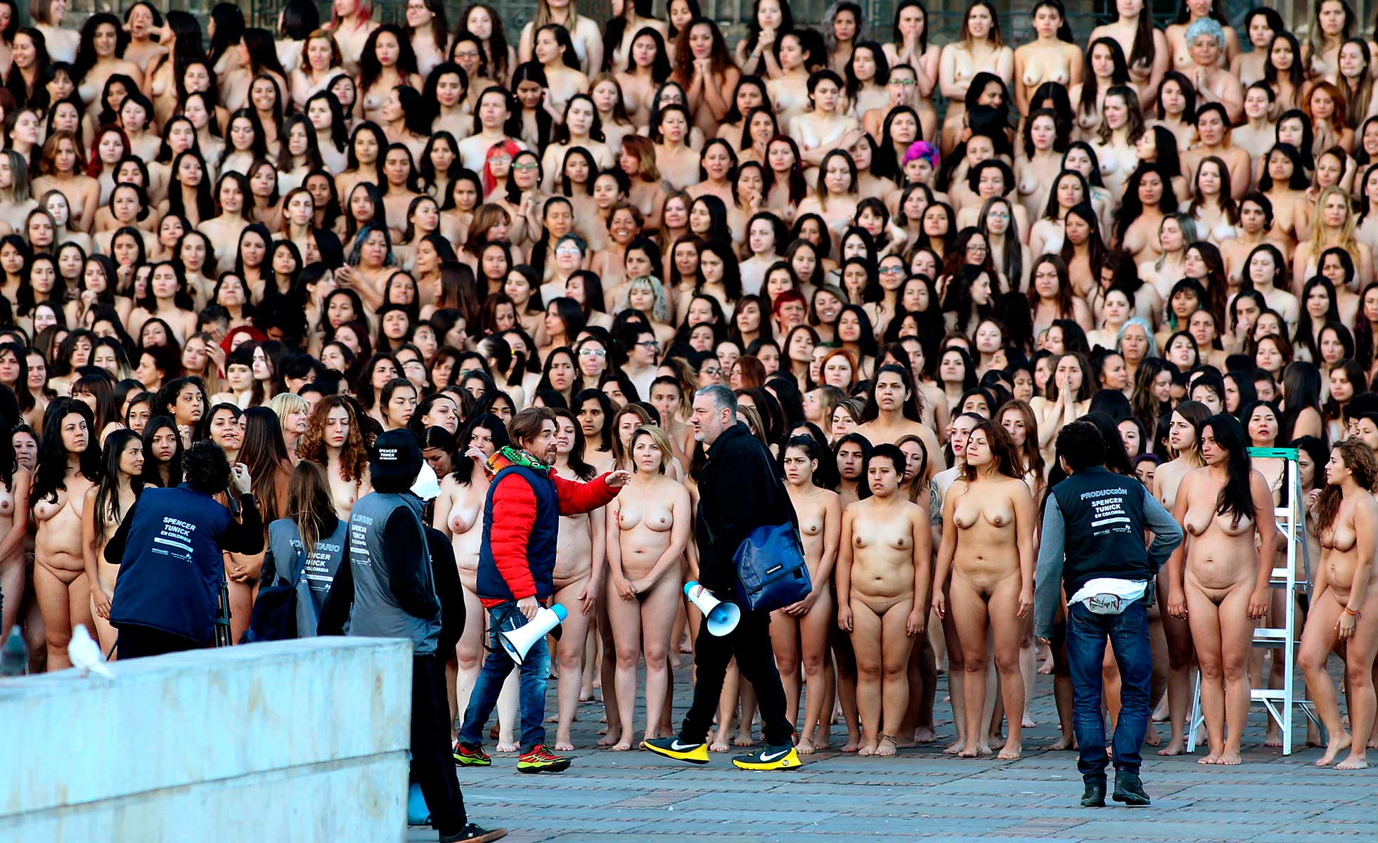 Naked groups of people.